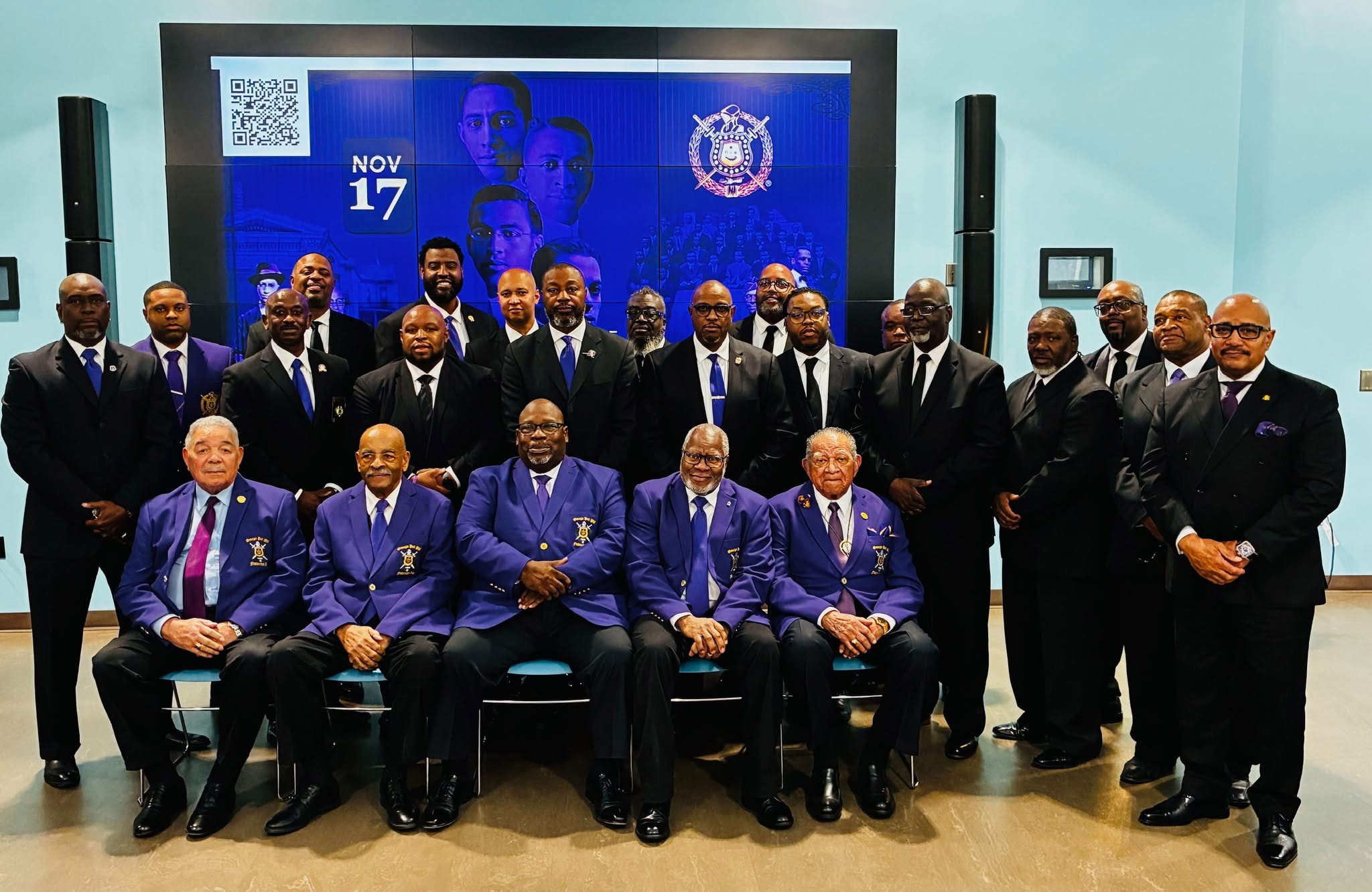 Alpha Iota brothers dressed formally and gathered together
